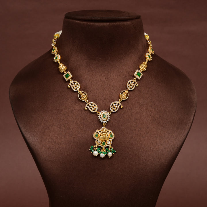 Traditional 92.5 silver temple necklace with Lakshmi and mango motifs, CZ stones, emerald stone detailing, and intricate heritage craftsmanship by Sri Fine Jewellery Hyderabad (https://srifinejewellery.com)