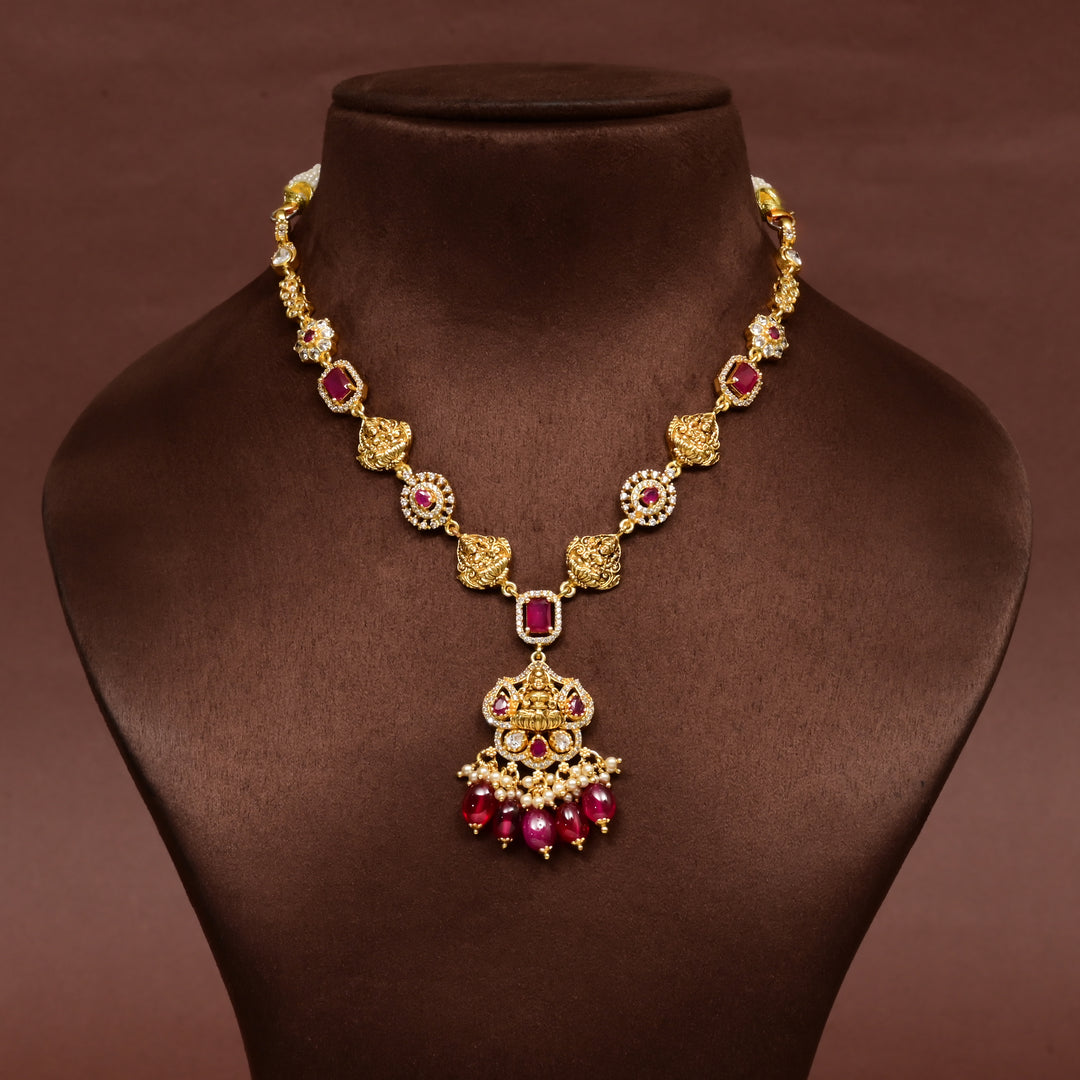 Traditional 92.5 silver temple necklace with Lakshmi motifs, ruby stone detailing, and intricate heritage craftsmanship by Sri Fine Jewellery Hyderabad (https://srifinejewellery.com)