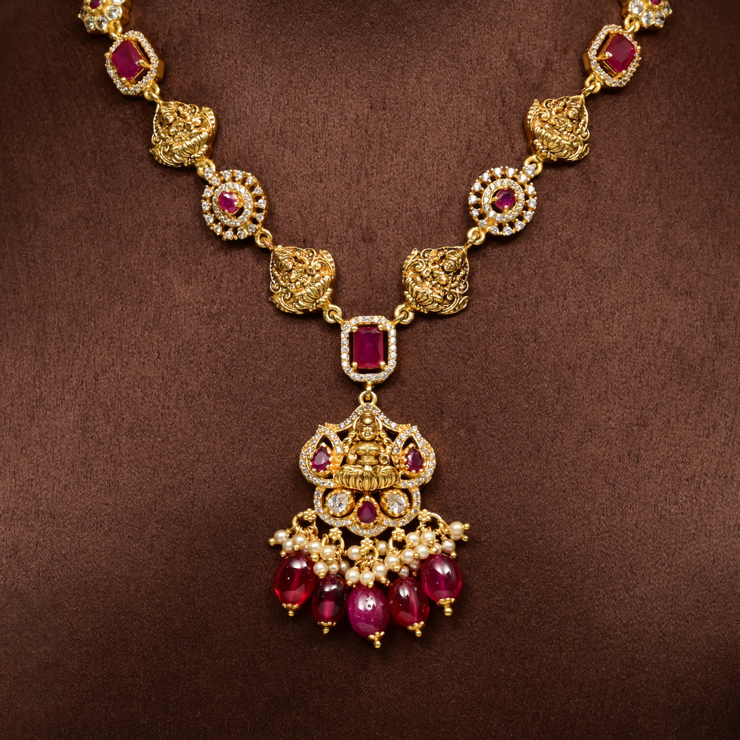 Traditional 92.5 silver temple necklace with Lakshmi motifs, ruby stone detailing, and intricate heritage craftsmanship by Sri Fine Jewellery Hyderabad (https://srifinejewellery.com)
