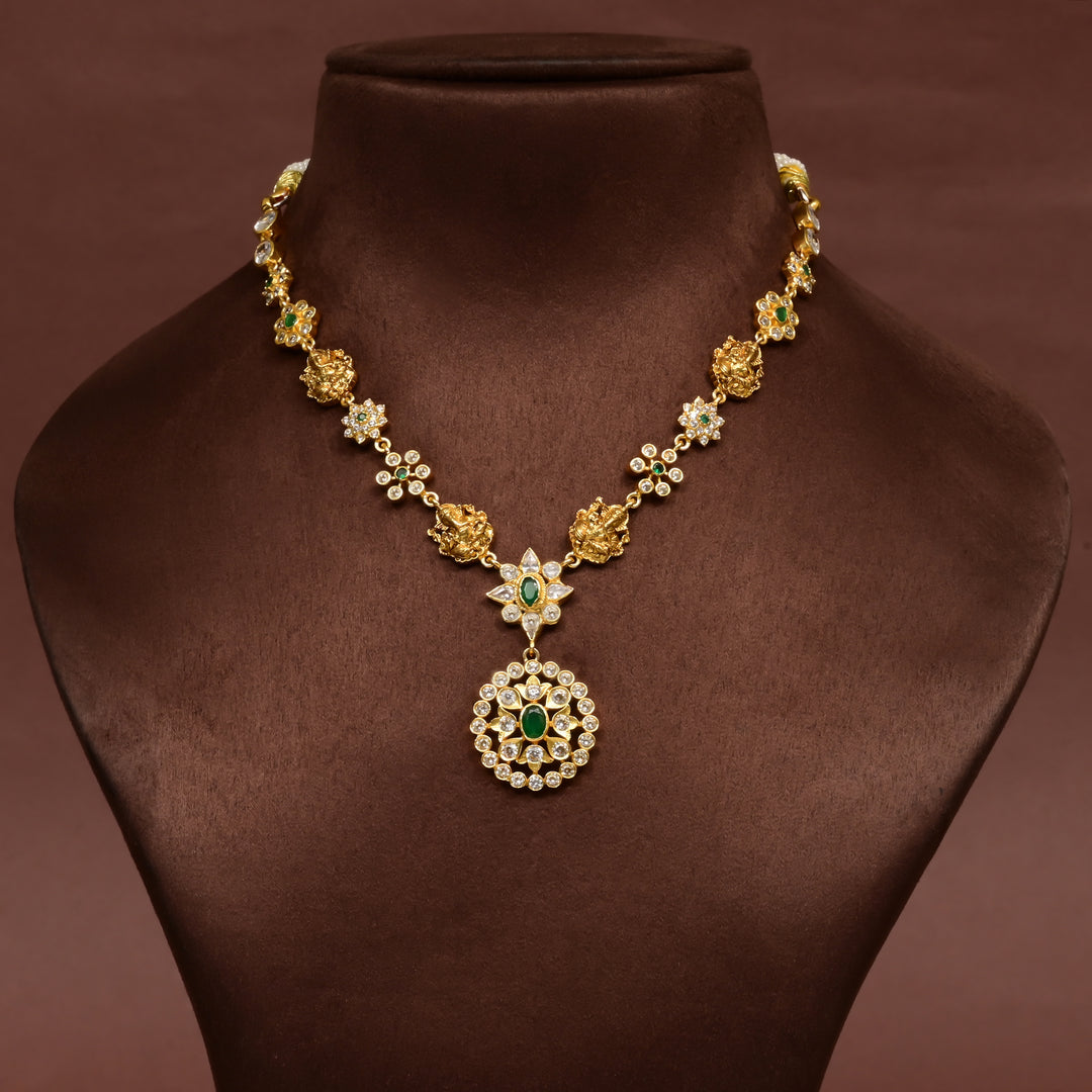 Traditional 92.5 silver temple necklace with Lakshmi motifs, emerald stone detailing, and intricate heritage craftsmanship by Sri Fine Jewellery Hyderabad (https://srifinejewellery.com)