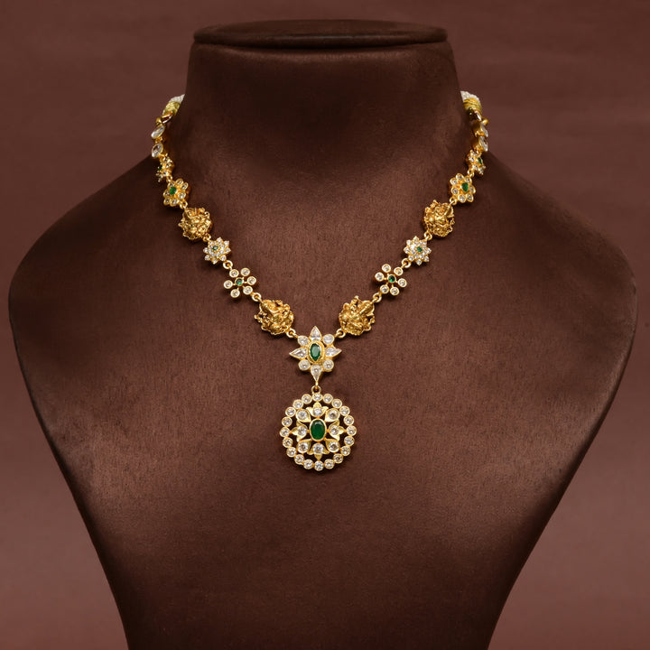 Traditional 92.5 silver temple necklace with Lakshmi motifs, emerald stone detailing, and intricate heritage craftsmanship by Sri Fine Jewellery Hyderabad (https://srifinejewellery.com)