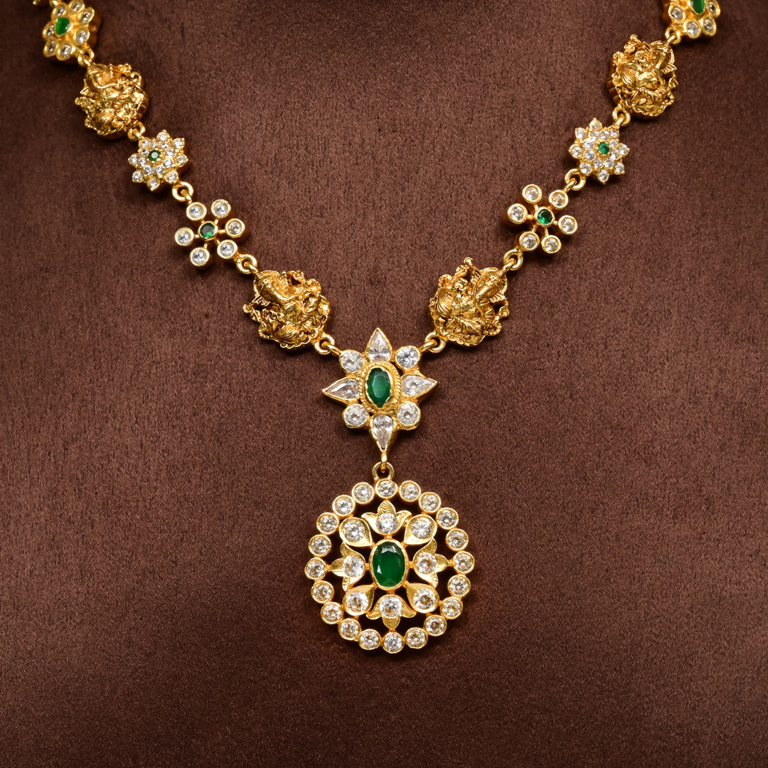 Traditional 92.5 silver temple necklace with Lakshmi motifs, CZ and emerald stone detailing, and intricate heritage craftsmanship by Sri Fine Jewellery Hyderabad (https://srifinejewellery.com)
