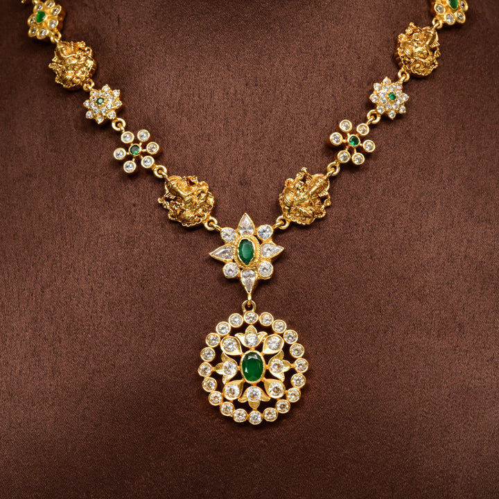 Traditional 92.5 silver temple necklace with Lakshmi motifs, CZ and emerald stone detailing, and intricate heritage craftsmanship by Sri Fine Jewellery Hyderabad (https://srifinejewellery.com)