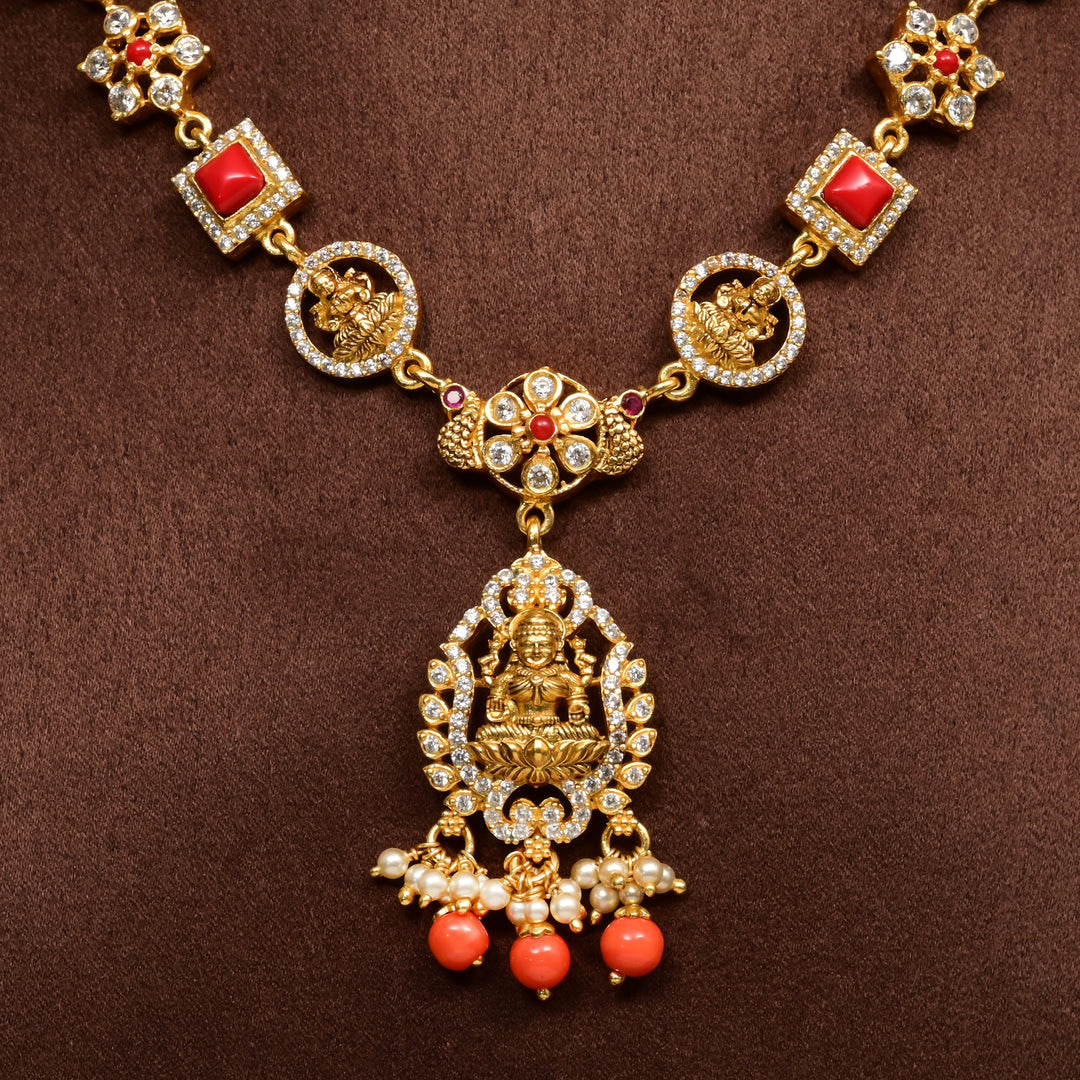 Close-up view of traditional 92.5 silver temple necklace with Lakshmi motifs, ruby stone detailing, and intricate heritage craftsmanship by Sri Fine Jewellery Hyderabad (https://srifinejewellery.com)