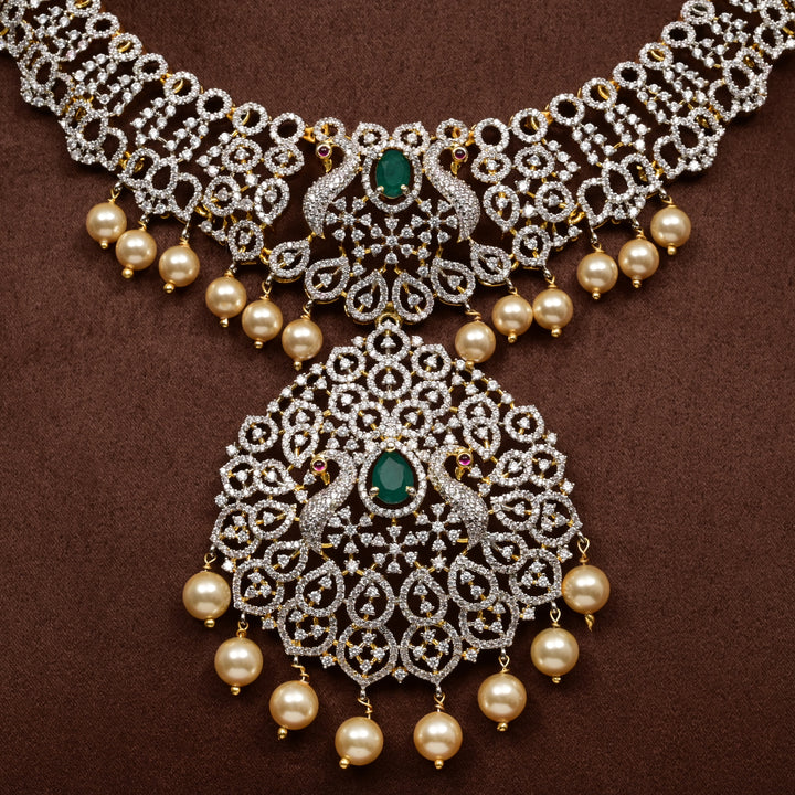 Close-up of Hriday collection of  92.5 silver short necklace with CZ stones, intricate floral motifs, and pendant design for bridal and festive wear by Sri Fine Jewellery, Hyderabad