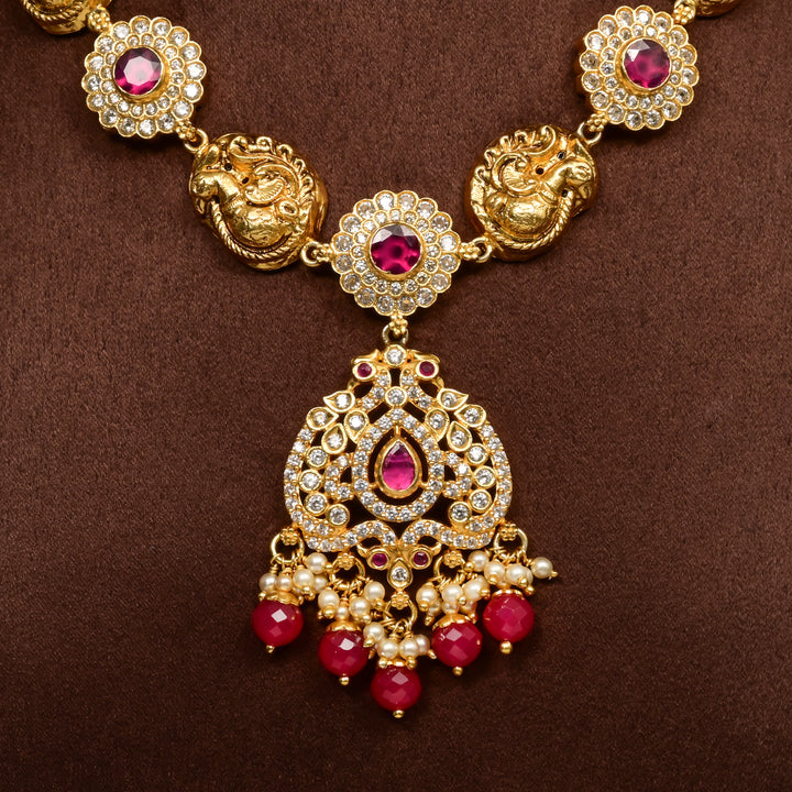 Traditional 92.5 silver temple necklace with peacock motifs, ruby stone detailing, and intricate heritage craftsmanship by Sri Fine Jewellery Hyderabad (https://srifinejewellery.com)