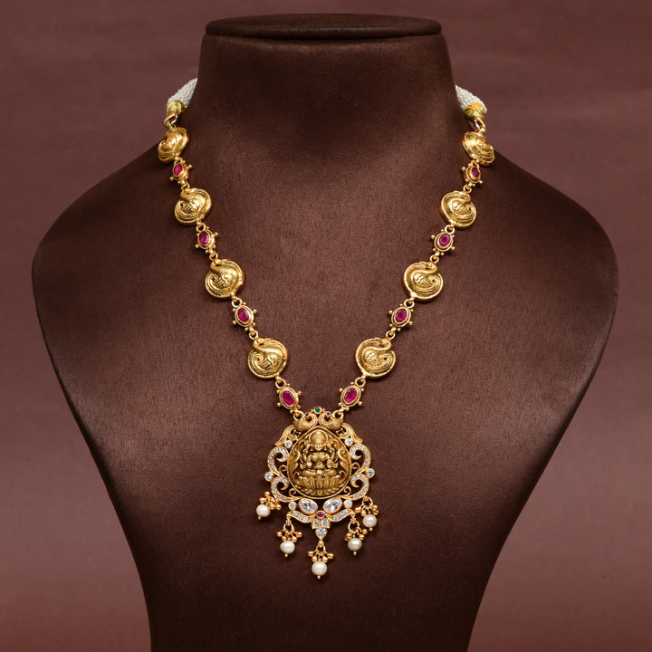 Traditional 92.5 silver temple necklace with Lakshmi and peacock motifs, ruby stone detailing, and intricate heritage craftsmanship by Sri Fine Jewellery Hyderabad (https://srifinejewellery.com)