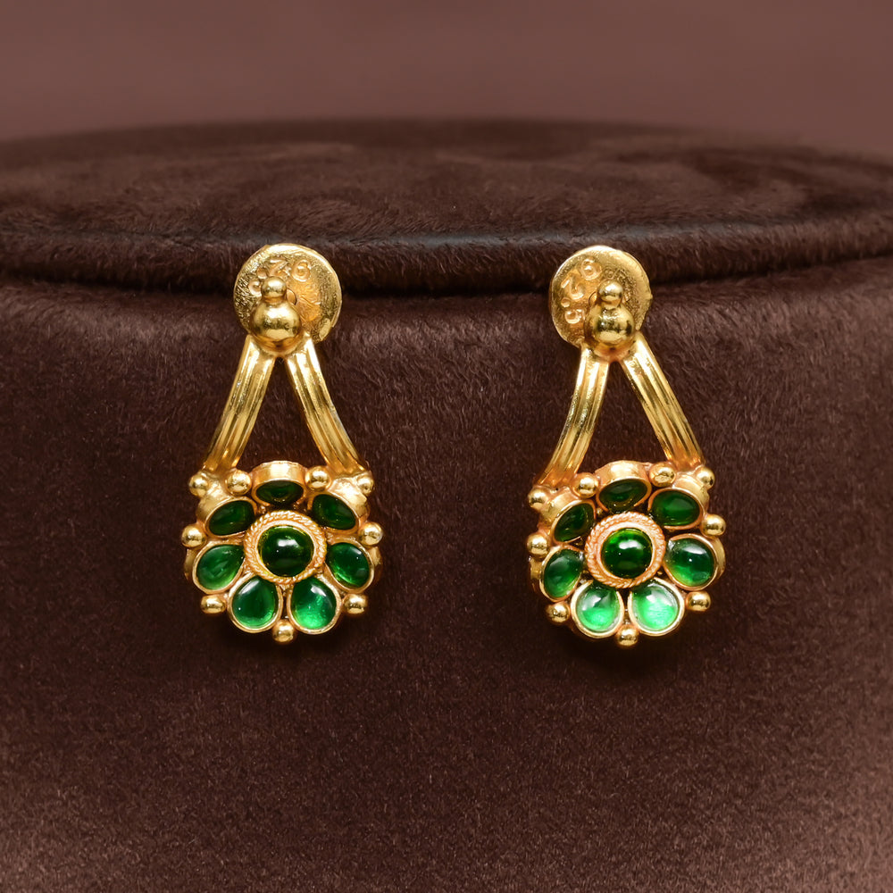 Traditional 92.5 silver earrings with floral motifs, emerald stone detailing, and intricate heritage craftsmanship by Sri Fine Jewellery Hyderabad (https://srifinejewellery.com)