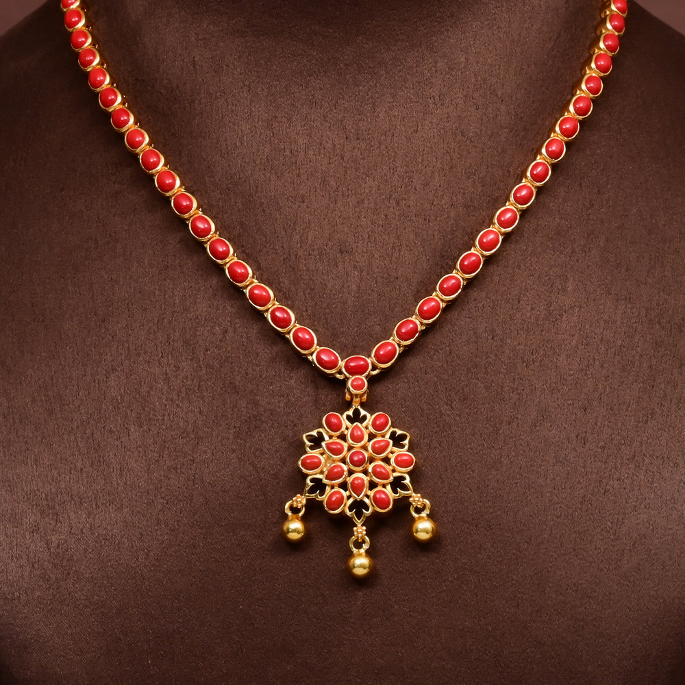 Red stone floral pendant necklace in premium 92.5 sterling silver with antique gold finish, elegant traditional jewellery design for women, handcrafted festive and wedding wear necklace by Sri Fine Jewellery.
