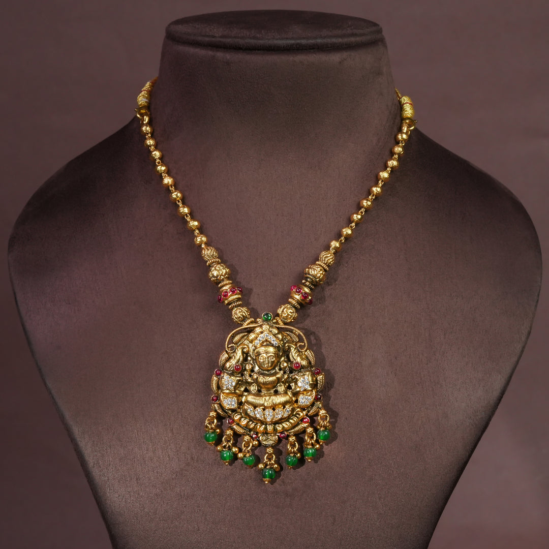 92.5 sterling silver temple necklace with Lakshmi pendant, cz stone accents, antique gold finish, and traditional South Indian bridal jewellery design by Sri Fine Jewellery Hyderabad.
