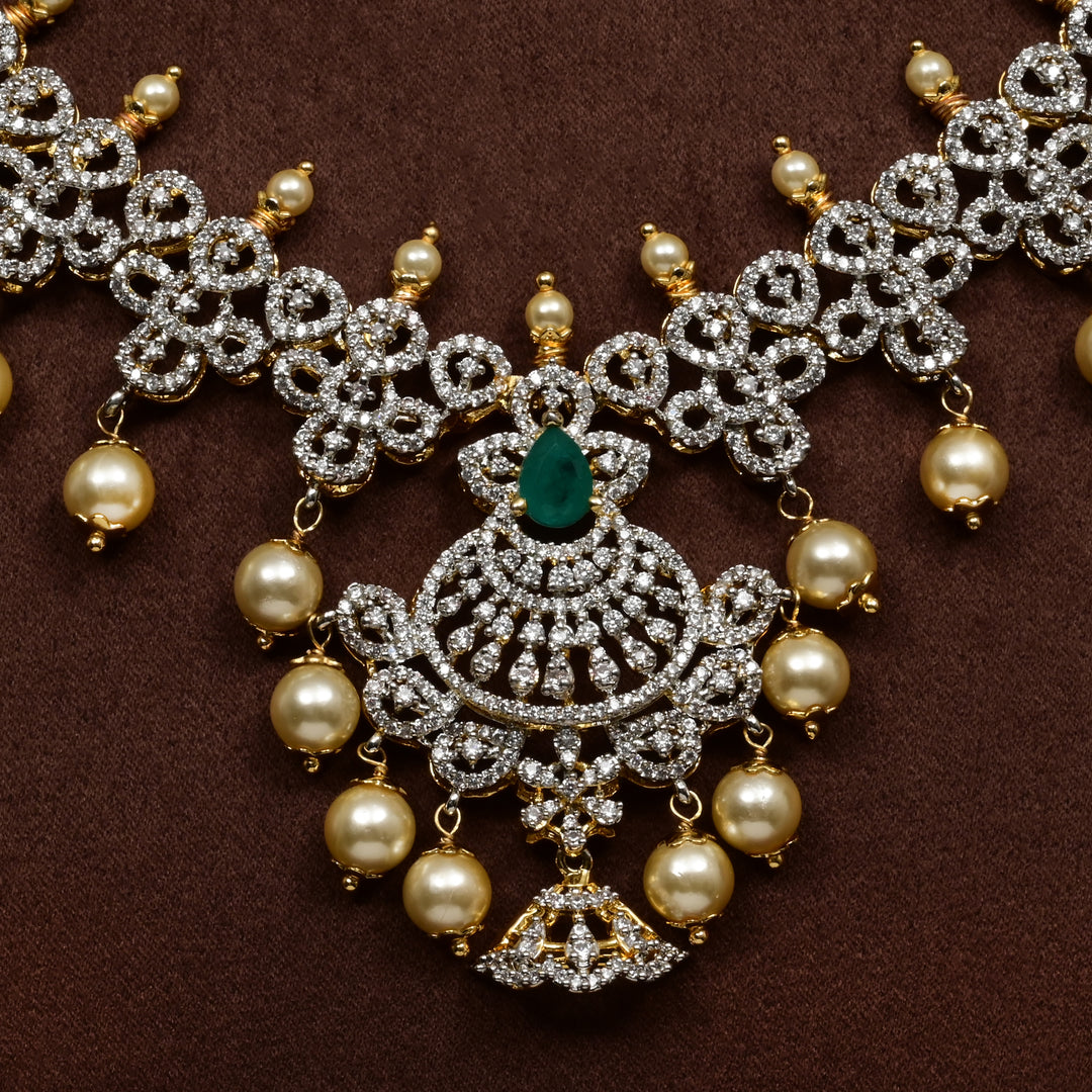  Close-up of Hriday collection of 92.5 silver short necklace with CZ stones, intricate floral motifs, and pendant design for bridal and festive wear by Sri fine jewellery, Hyderabad.