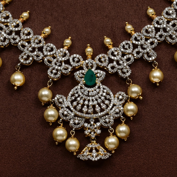  Close-up of Hriday collection of 92.5 silver short necklace with CZ stones, intricate floral motifs, and pendant design for bridal and festive wear by Sri fine jewellery, Hyderabad.