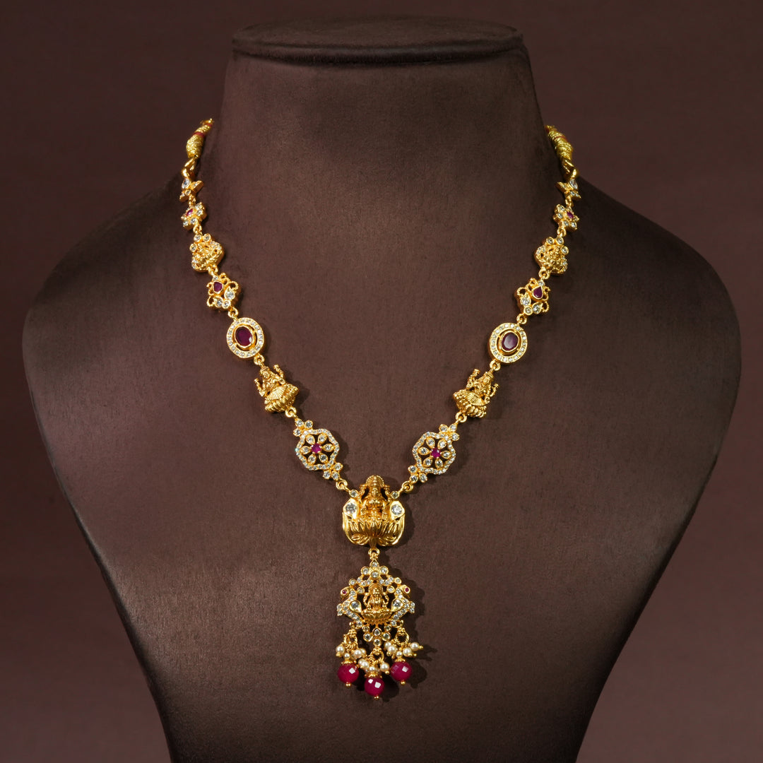 Traditional 92.5 silver temple necklace with ruby stone detailing, intricate heritage motifs, and premium craftsmanship by Sri Fine Jewellery Hyderabad.
(https://srifinejewellery.com)
