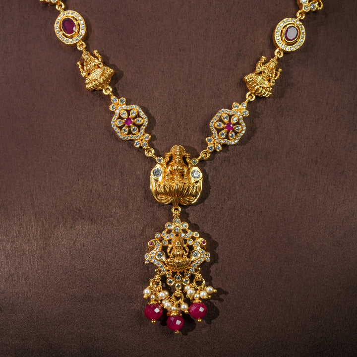 Close-up view of traditional 92.5 silver temple necklace with ruby stone detailing, intricate heritage motifs, and premium craftsmanship by Sri Fine Jewellery Hyderabad.
(https://srifinejewellery.com)
