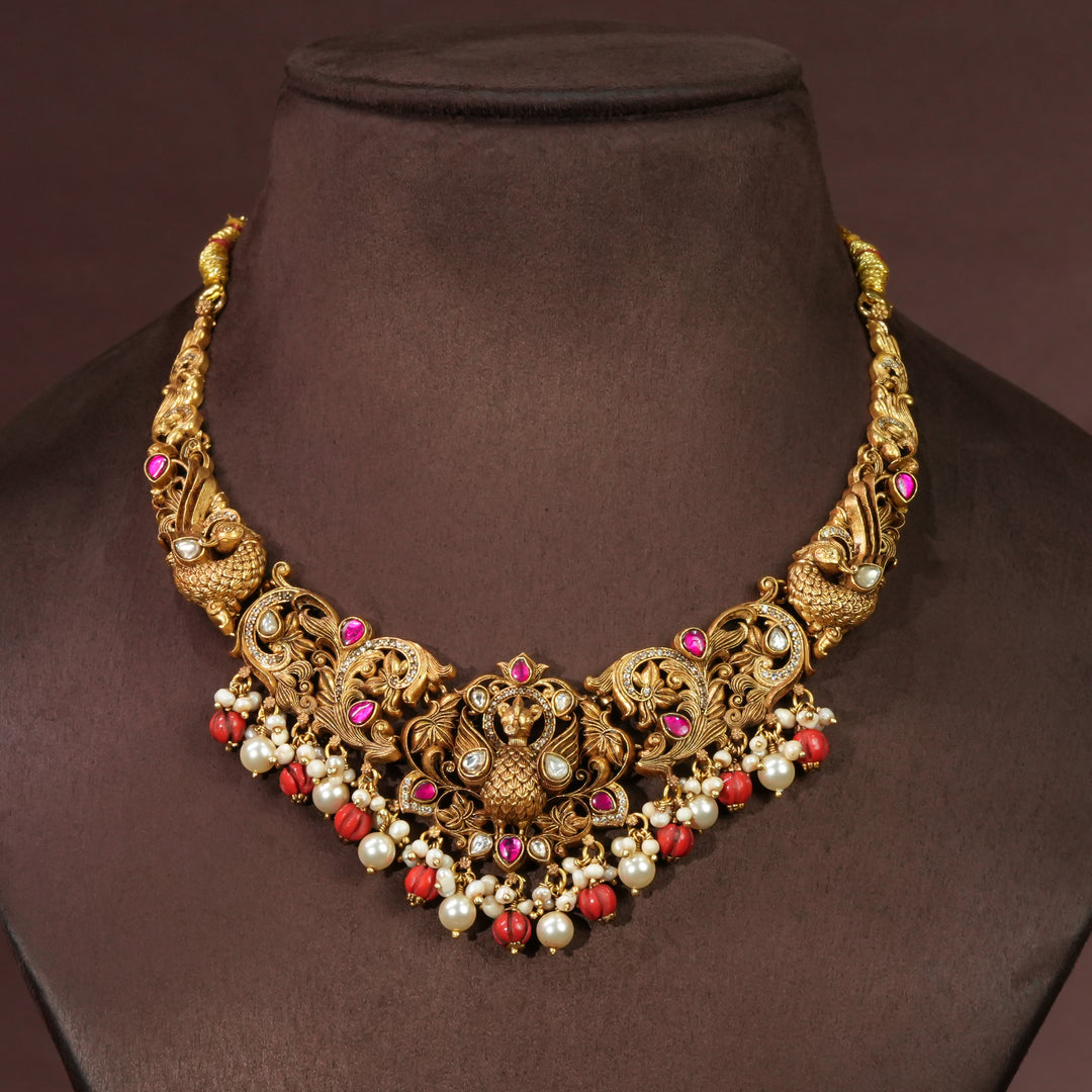 Full view of premium 92.5 silver temple necklace with intricate peacock design detailing and pearl drops by Sri Fine Jewellery, Hyderabd(https://srifinejewellery.com)