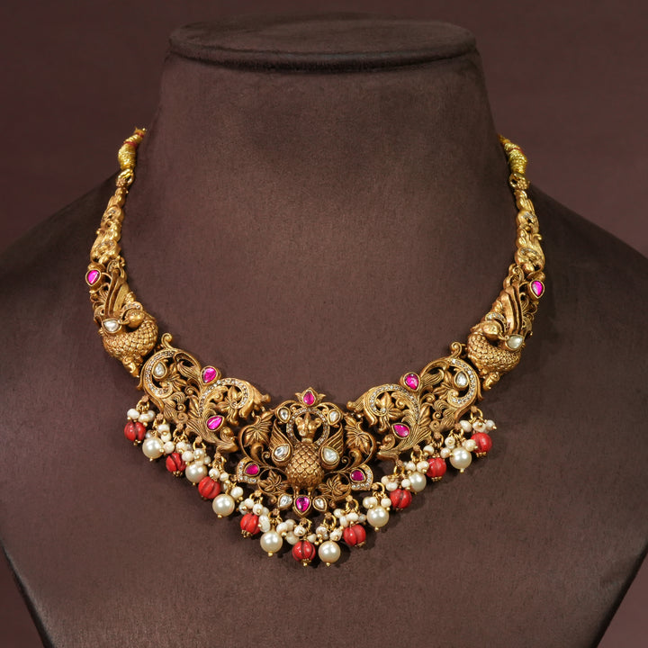 Full view of premium 92.5 silver temple necklace with intricate peacock design detailing and pearl drops by Sri Fine Jewellery, Hyderabd(https://srifinejewellery.com)