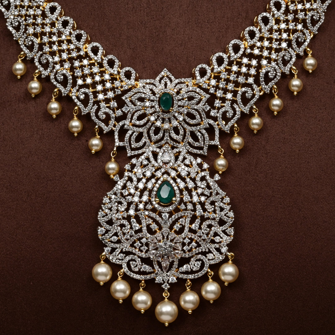 Close-up of Hriday collection of  92.5 silver short necklace with CZ stones, intricate floral motifs, and pendant design for bridal and festive wear by Sri Fine Jewellery, Hyderabad