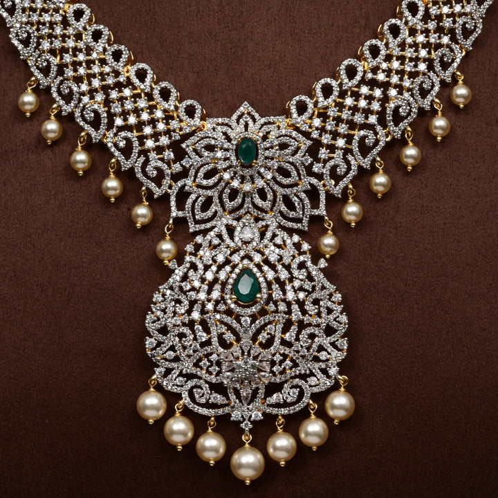 Close-up of Hriday collection of  92.5 silver short necklace with CZ stones, intricate floral motifs, and pendant design for bridal and festive wear by Sri Fine Jewellery, Hyderabad