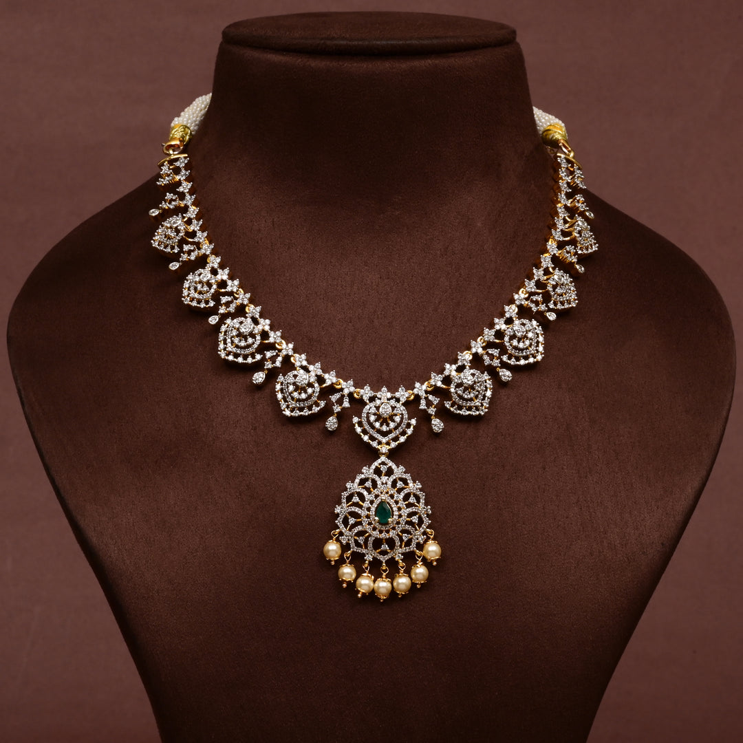 Hriday collection of 92.5 silver short necklace with CZ stones, intricate floral motifs, and pendant design for bridal and festive wear by Sri fine jewellery, Hyderabad.