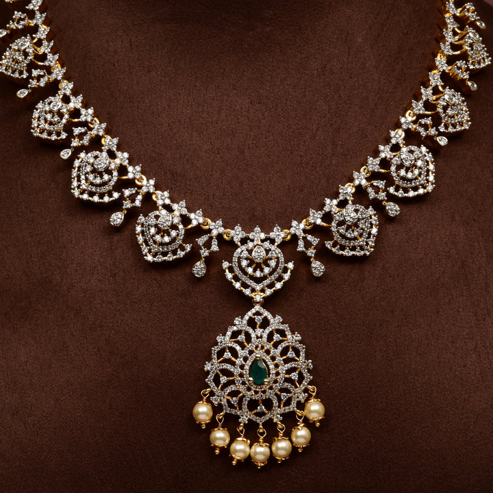 Close-up of Hriday collection of 92.5 silver short necklace with CZ stones, intricate floral motifs, and pendant design for bridal and festive wear by Sri fine jewellery, Hyderabad.