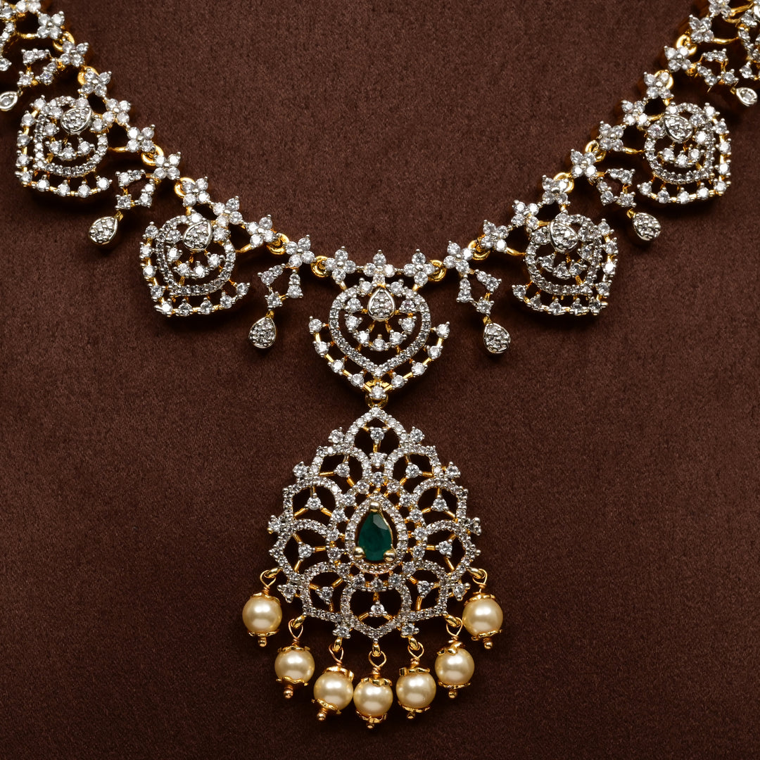 Close-up of Hriday collection of 92.5 silver short necklace with CZ stones, intricate floral motifs, and pendant design for bridal and festive wear by Sri fine jewellery, Hyderabad.