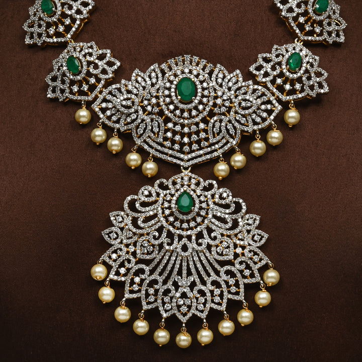 Close-up of Hriday collection of 92.5 silver short necklace with CZ stones, intricate floral motifs, and pendant design for bridal and festive wear by Sri fine jewellery, Hyderabad.