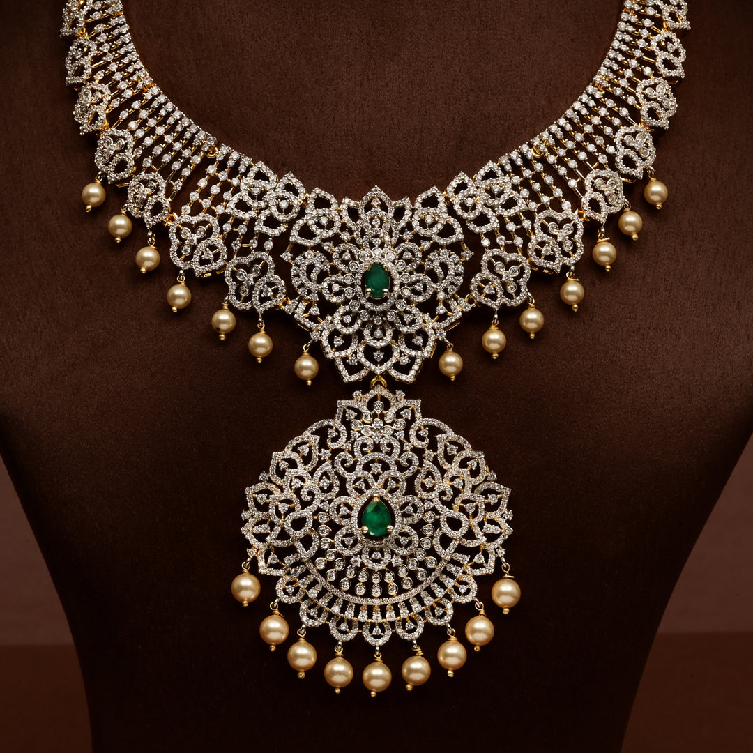 Front close-up view of premium 92.5 silver cz emerald necklace with intricate detailing and pearl drops by Sri Fine Jewellery, Hyderabd
(https://srifinejewellery.com)