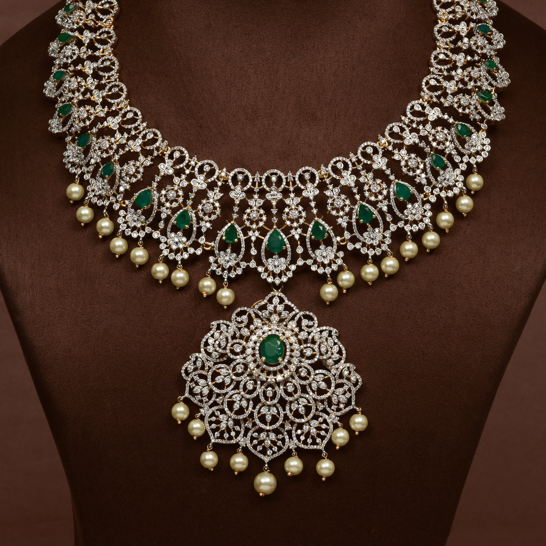 Close-up of Hriday collection of 92.5 silver short necklace with CZ stones, intricate floral motifs, and pendant design for bridal and festive wear by Sri fine jewellery, Hyderabad.