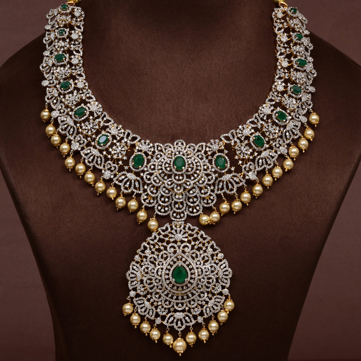 Close-up of Hriday collection of 92.5 silver short necklace with CZ stones, intricate floral motifs, and pendant design for bridal and festive wear by Sri fine jewellery, Hyderabad.