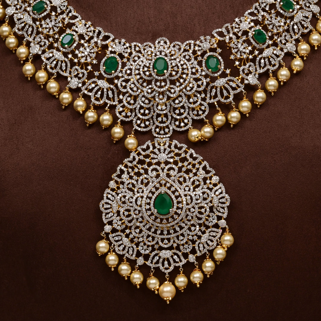 Close-up of Hriday collection of 92.5 silver short necklace with CZ stones, intricate floral motifs, and pendant design for bridal and festive wear by Sri fine jewellery, Hyderabad.