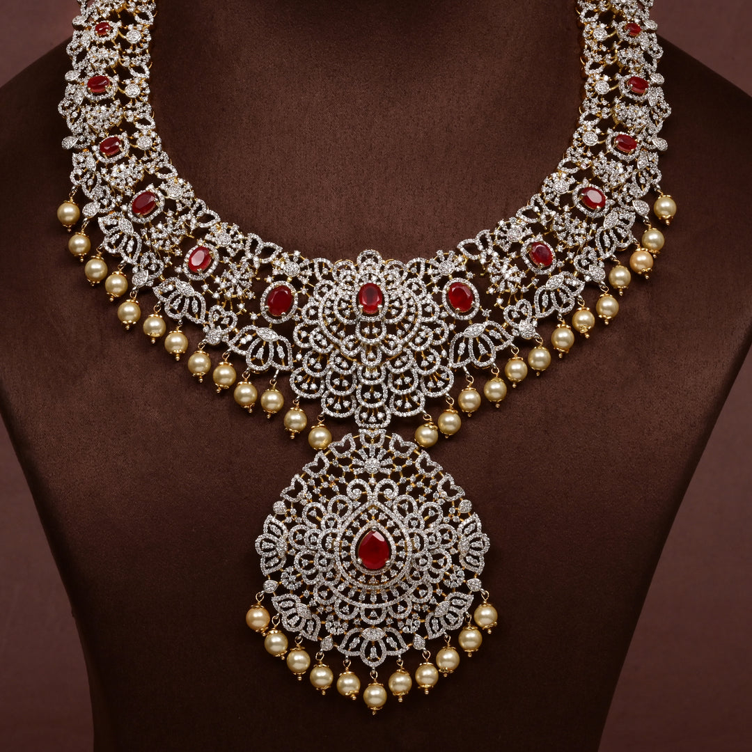 Close-up of Hriday collection of 92.5 silver short necklace with CZ stones, intricate floral motifs, and pendant design for bridal and festive wear by Sri fine jewellery, Hyderabad.
