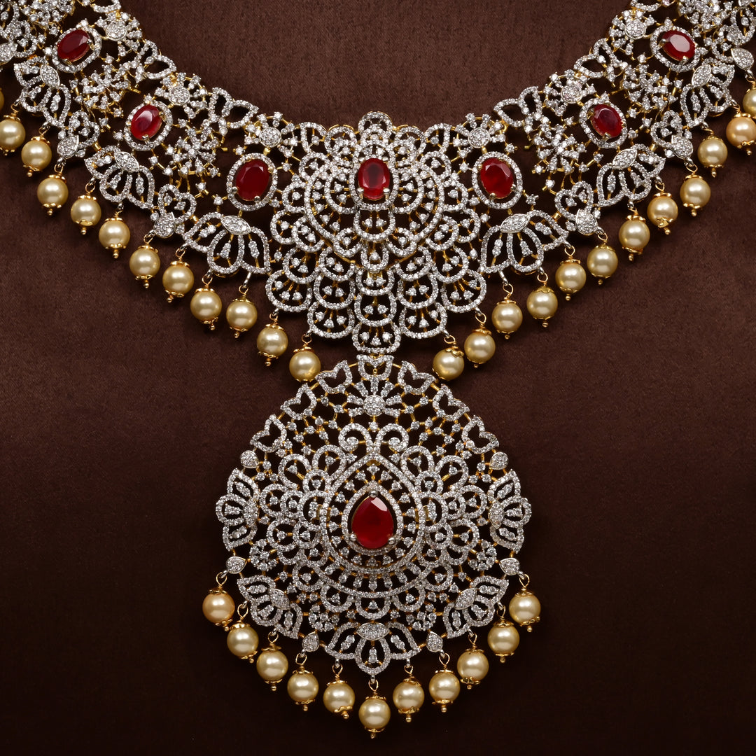 Close-up of Hriday collection of 92.5 silver short necklace with CZ stones, intricate floral motifs, and pendant design for bridal and festive wear by Sri fine jewellery, Hyderabad.