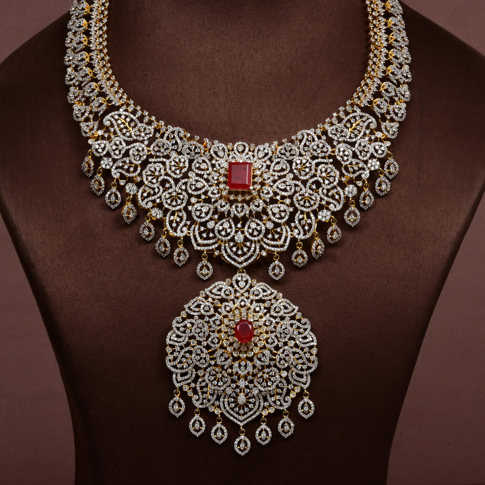 Close-up of Hriday collection of 92.5 silver short necklace with CZ stones, intricate floral motifs, and pendant design for bridal and festive wear by Sri fine jewellery, Hyderabad.