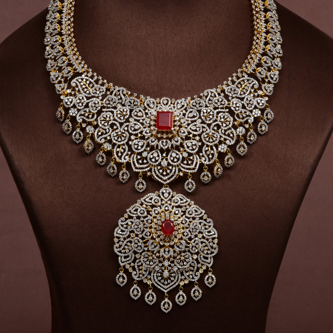 Close-up of Hriday collection of 92.5 silver short necklace with CZ stones, intricate floral motifs, and pendant design for bridal and festive wear by Sri fine jewellery, Hyderabad.