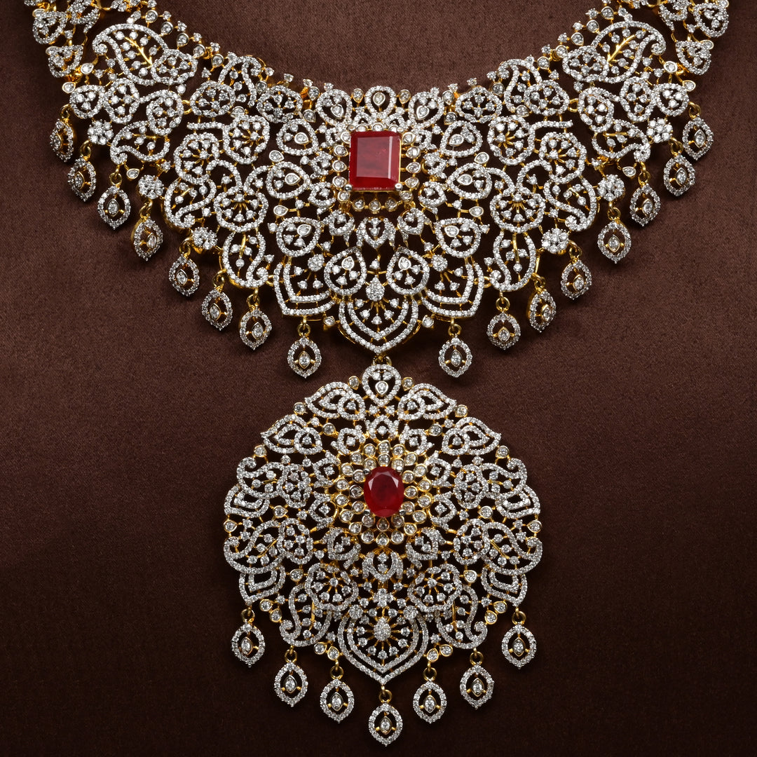 Close-up of Hriday collection of 92.5 silver short necklace with CZ stones, intricate floral motifs, and pendant design for bridal and festive wear by Sri fine jewellery, Hyderabad.