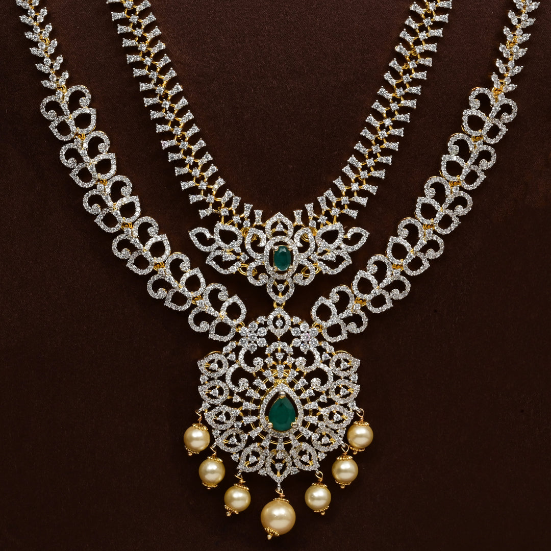 Close-up of Hriday collection of 92.5 silver long necklace with CZ stones, intricate floral motifs, and pendant design for bridal and festive wear by Sri fine jewellery, Hyderabad.