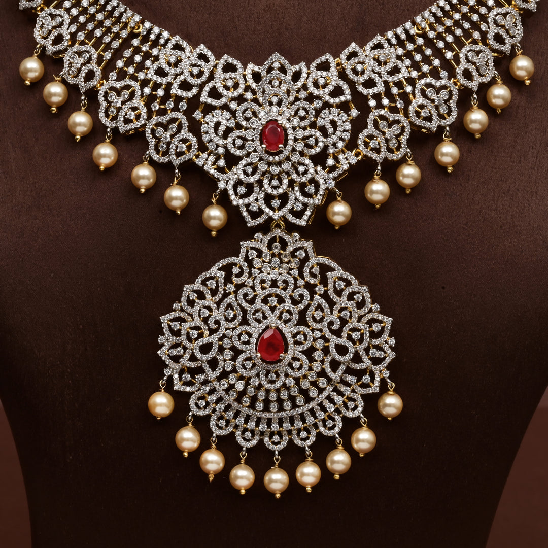 Close-up of Hriday collection of 92.5 silver short necklace with CZ stones, intricate  design for bridal and festive wear by Sri fine jewellery, Hyderabad.
(https://www.srifinejewellery.com)