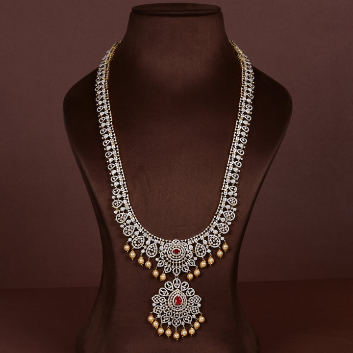 Luxury diamond-look silver cz ruby necklace with premium cz stones, semi-precious ruby stone and  pearl drops in 92.5 silver, bridal wedding jewellery with gold finish by Sri Fine Jewellery Punjagutta Hyderabad.