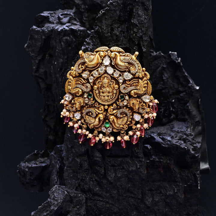 Premium 92.5 silver temple pendant featuring traditional Lakshmi motif, kemp stones, antique finish and intricate handcrafted South Indian design by Sri Fine Jewellery, Hyderabad.
(https://www.srifinejewellery.com
