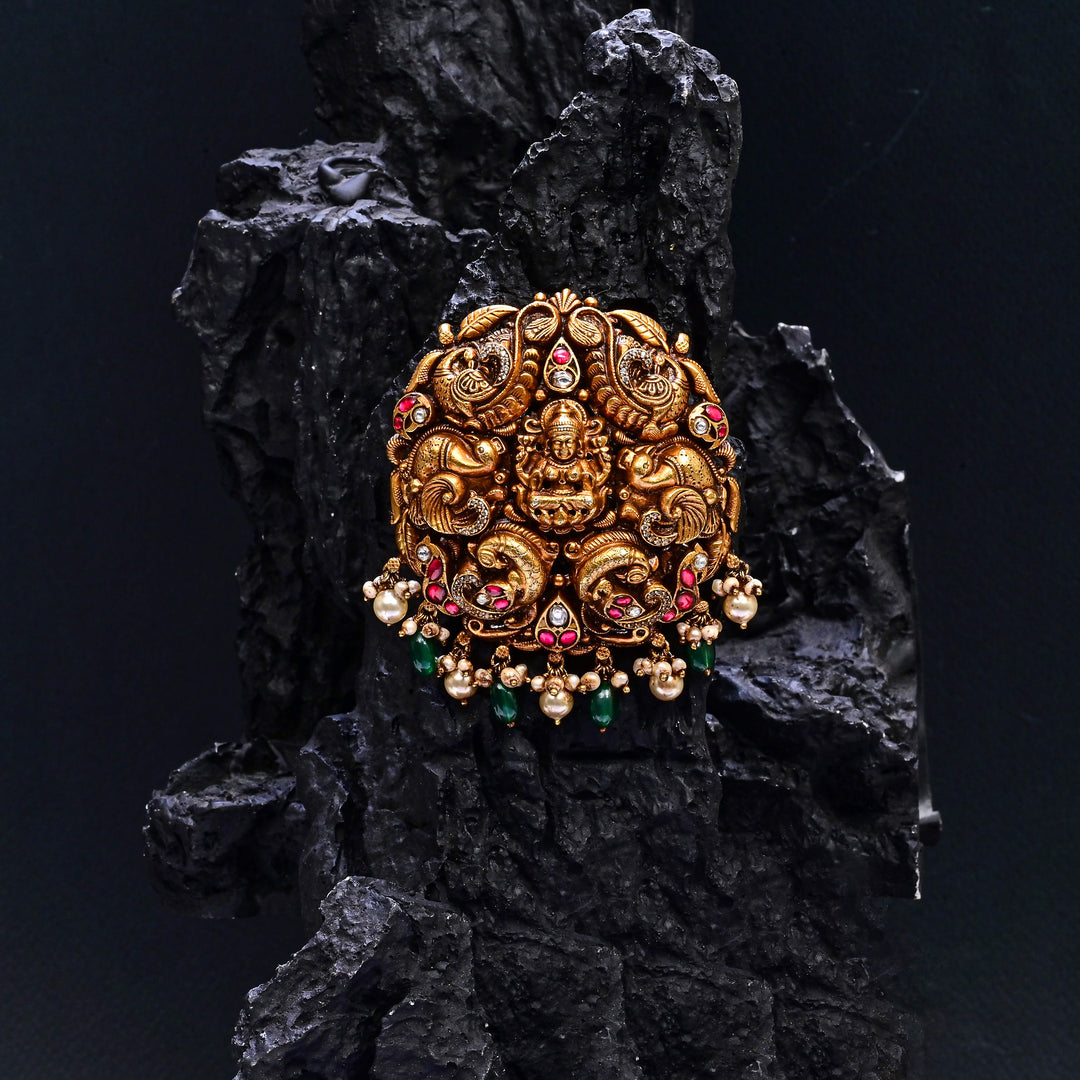 Premium 92.5 silver temple pendant featuring traditional Lakshmi motif, kemp stones, antique finish and intricate handcrafted South Indian design by Sri Fine Jewellery, Hyderabad.
(https://www.srifinejewellery.com