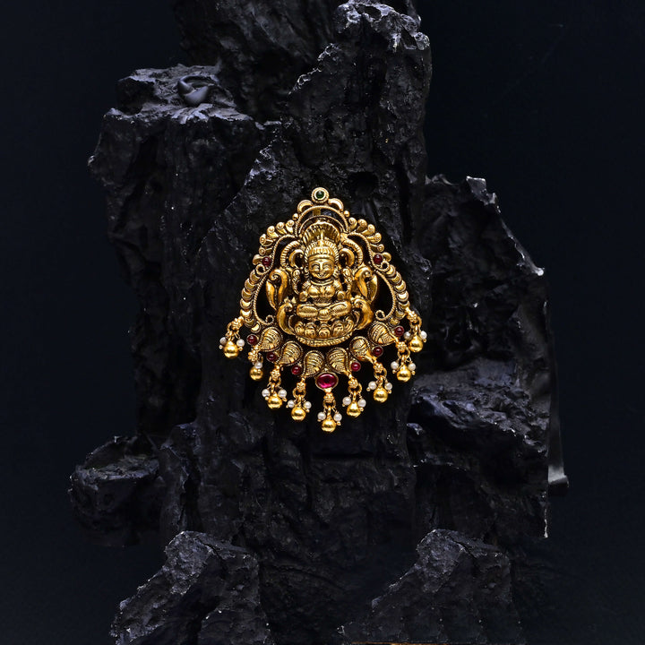 Premium 92.5 silver temple pendant featuring traditional Lakshmi motif, kemp stones, antique finish and intricate handcrafted South Indian design by Sri Fine Jewellery, Hyderabad.
(https://www.srifinejewellery.com