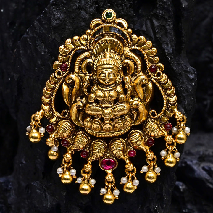 Premium 92.5 silver temple pendant featuring traditional Lakshmi motif, kemp stones, antique finish and intricate handcrafted South Indian design by Sri Fine Jewellery, Hyderabad.
(https://www.srifinejewellery.com