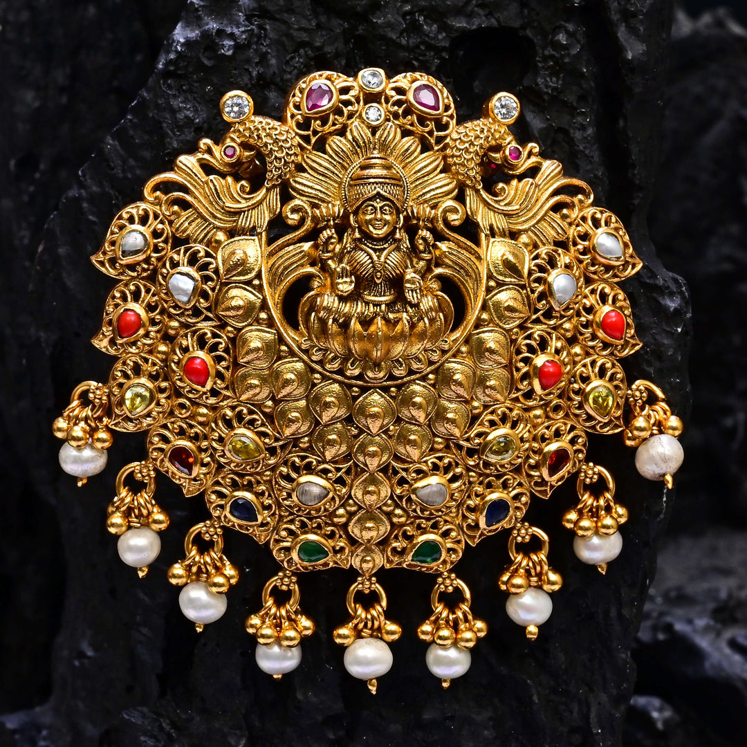 Premium 92.5 silver temple pendant featuring traditional Lakshmi motif, kemp stones, antique finish and intricate handcrafted South Indian design by Sri Fine Jewellery, Hyderabad.
(https://www.srifinejewellery.com