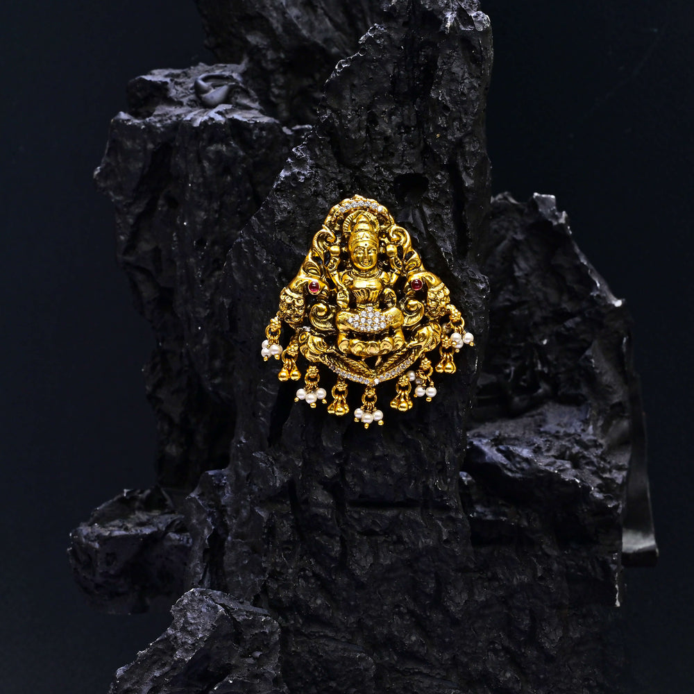 Premium 92.5 silver temple pendant featuring traditional Lakshmi motif, kemp stones, antique finish and intricate handcrafted South Indian design by Sri Fine Jewellery, Hyderabad.
(https://www.srifinejewellery.com)