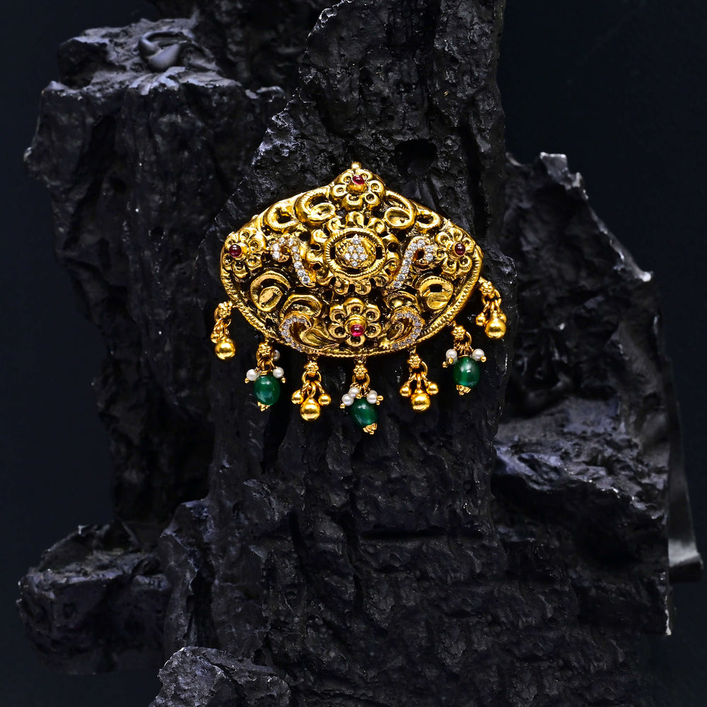 Premium 92.5 silver temple pendant featuring traditional kemp stones, antique finish and intricate handcrafted South Indian design by Sri Fine Jewellery, Hyderabad.
(https://www.srifinejewellery.com)