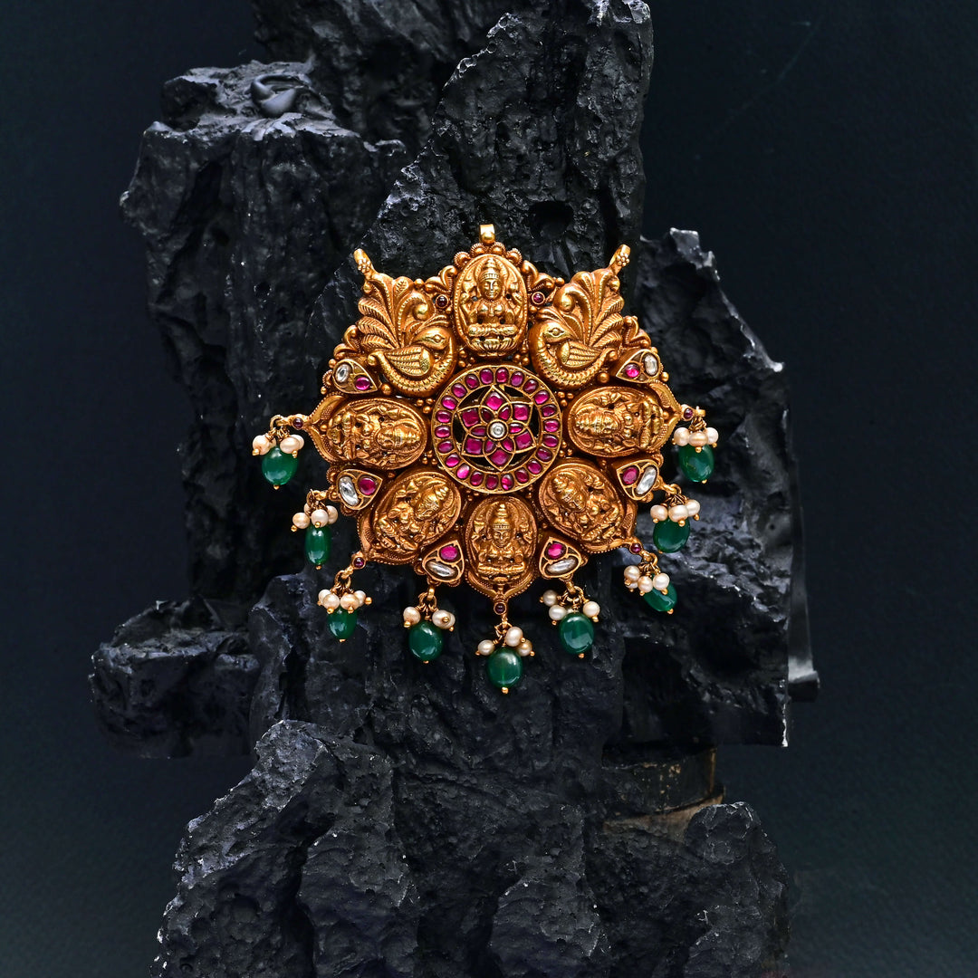 Premium 92.5 silver temple pendant featuring traditional Lakshmi motif, kemp stones, antique finish and intricate handcrafted South Indian design by Sri Fine Jewellery, Hyderabad.
(https://www.srifinejewellery.com)