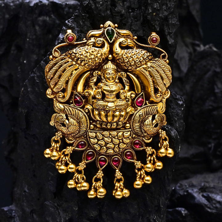 Premium 92.5 silver temple pendant featuring traditional Lakshmi motif, kemp stones, antique finish and intricate handcrafted South Indian design by Sri Fine Jewellery, Hyderabad.
(https://www.srifinejewellery.com)