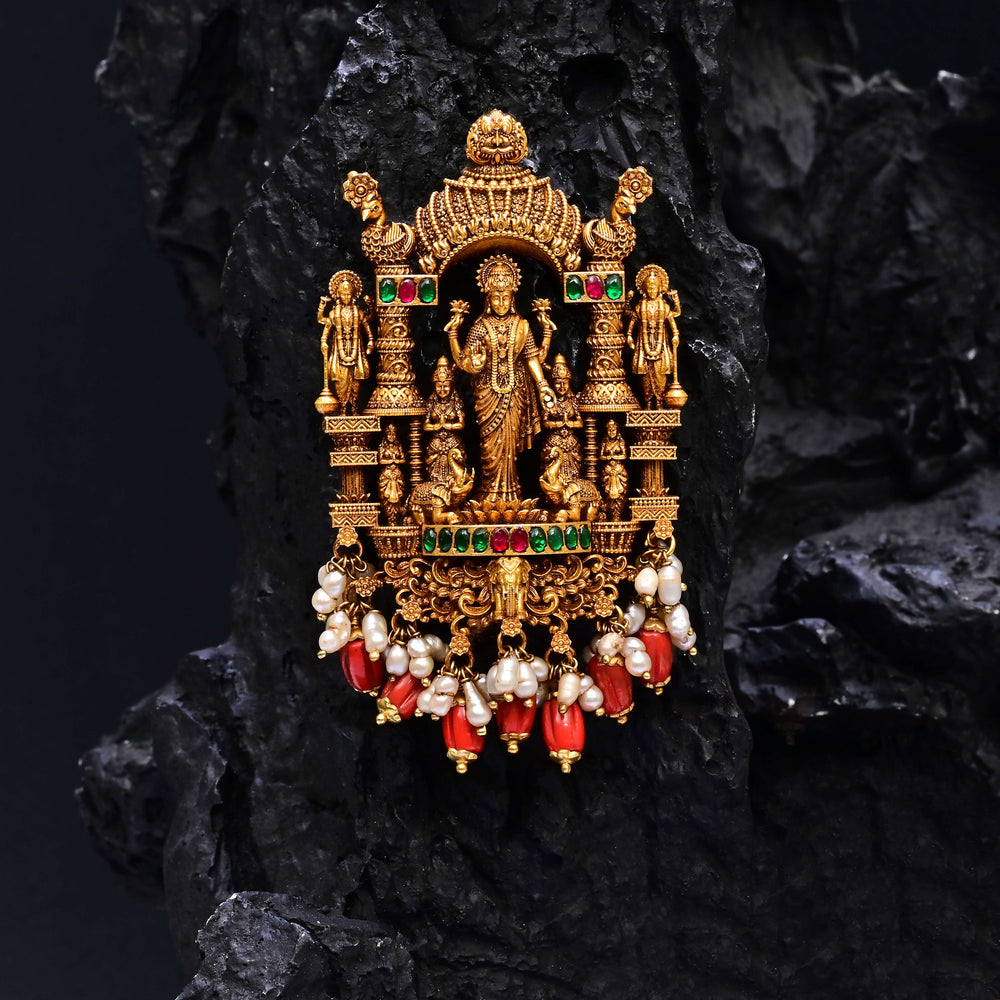 Premium 92.5 silver temple pendant featuring traditional Lakshmi motif, kemp stones, antique finish and intricate handcrafted South Indian design by Sri Fine Jewellery, Hyderabad.
(https://www.srifinejewellery.com)