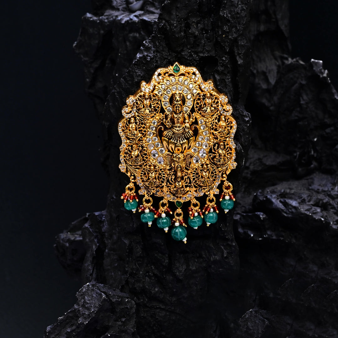 Premium 92.5 silver temple pendant featuring traditional Lakshmi motif, kemp stones, antique finish and intricate handcrafted South Indian design by Sri Fine Jewellery, Hyderabad.
(https://www.srifinejewellery.com)