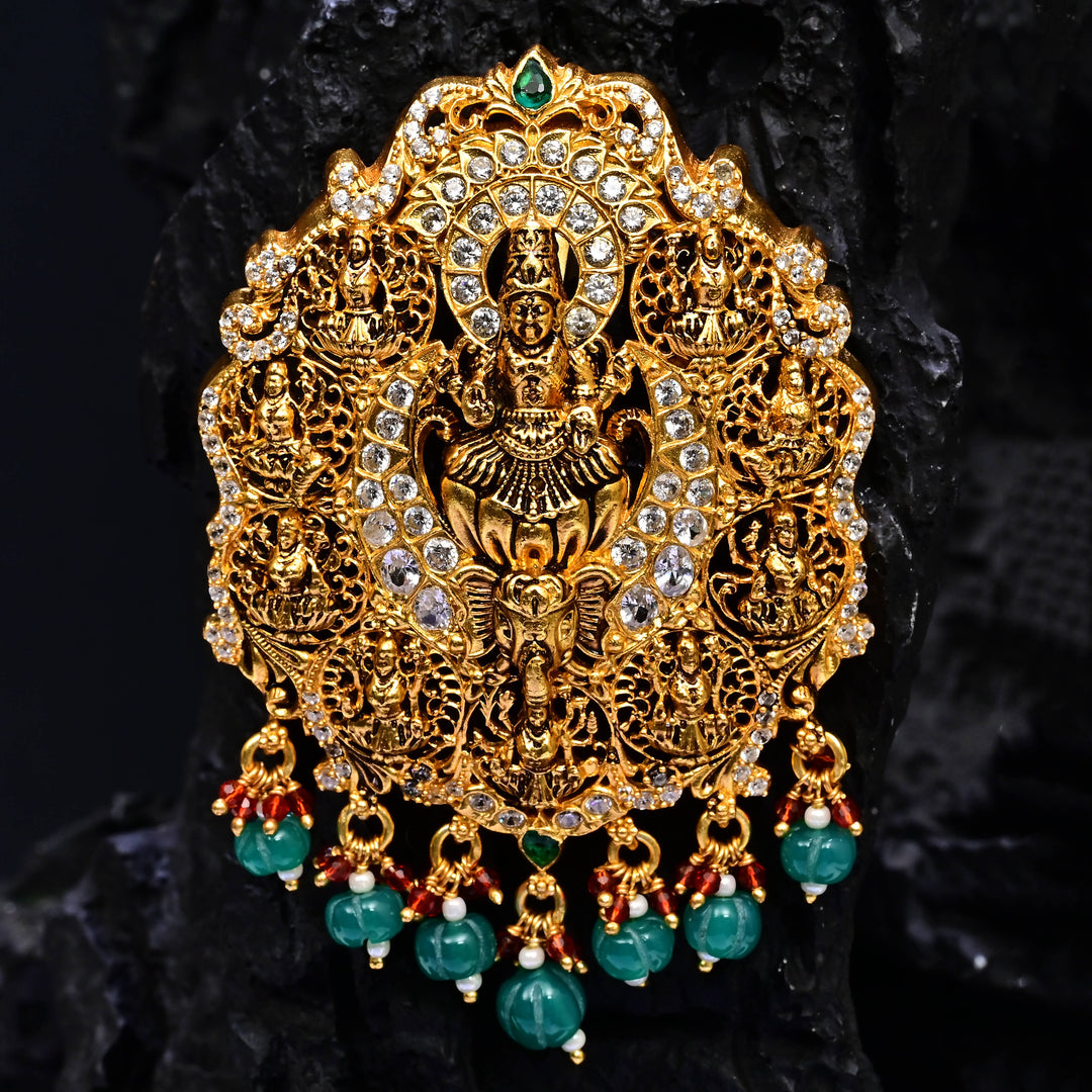 Premium 92.5 silver temple pendant featuring traditional Lakshmi motif, kemp stones, antique finish and intricate handcrafted South Indian design by Sri Fine Jewellery, Hyderabad.
(https://www.srifinejewellery.com)